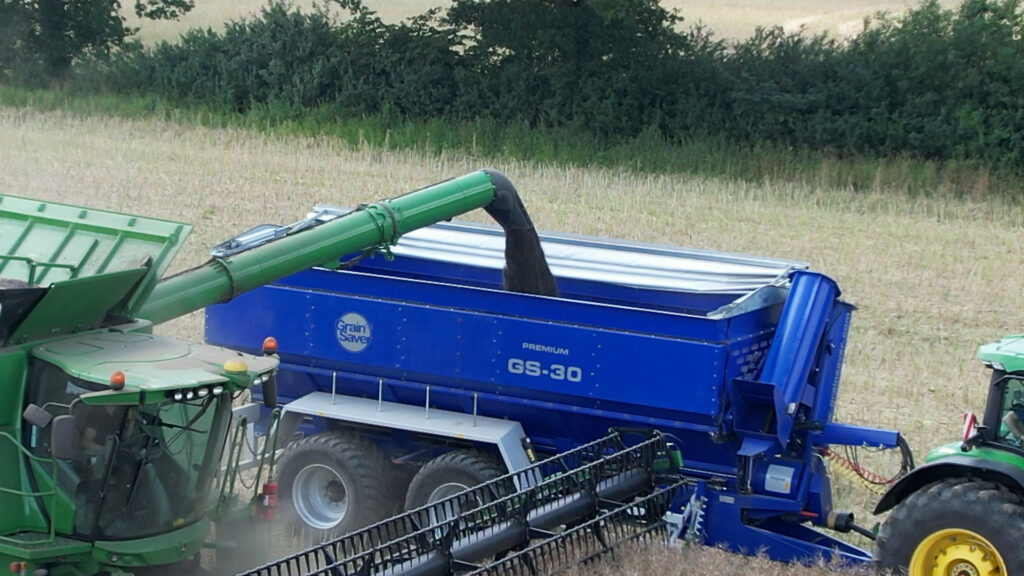 Harvester offloading to Grain Saver GS-30 grain cart