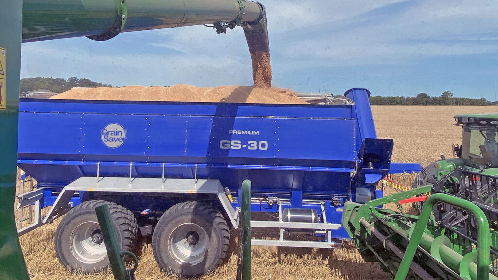 Harvester offloading to Grain Saver GS-30 grain cart